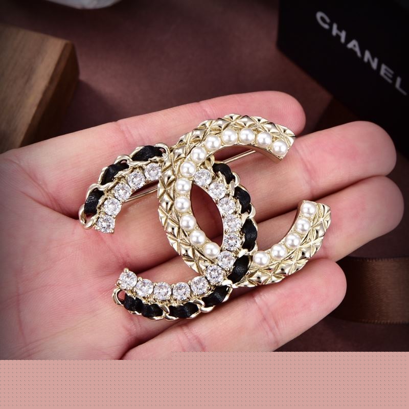 Ch*el brooches
